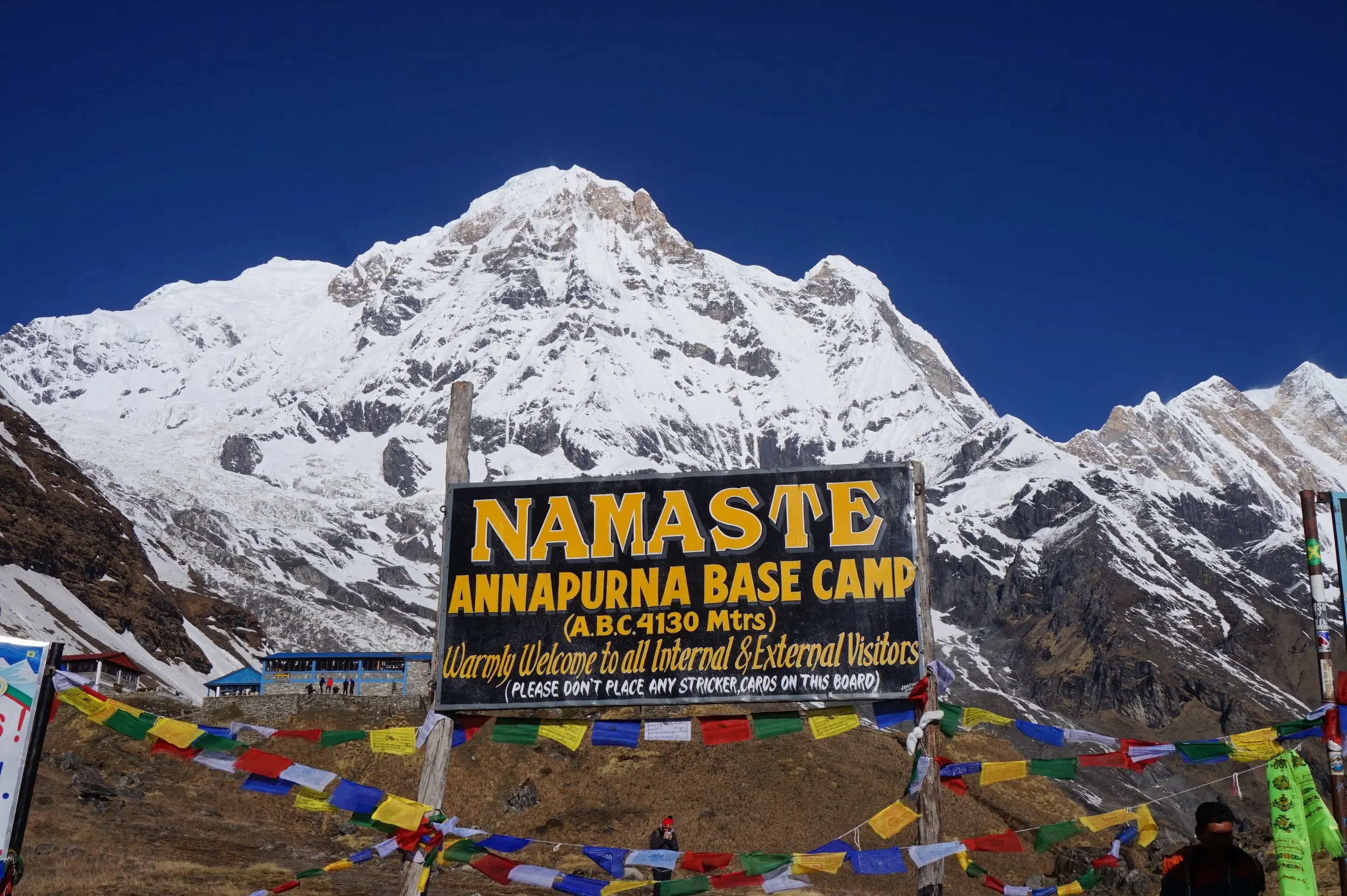 Annapurna Base Camp nestled among snow-capped peaks in the Nepal Himalayas