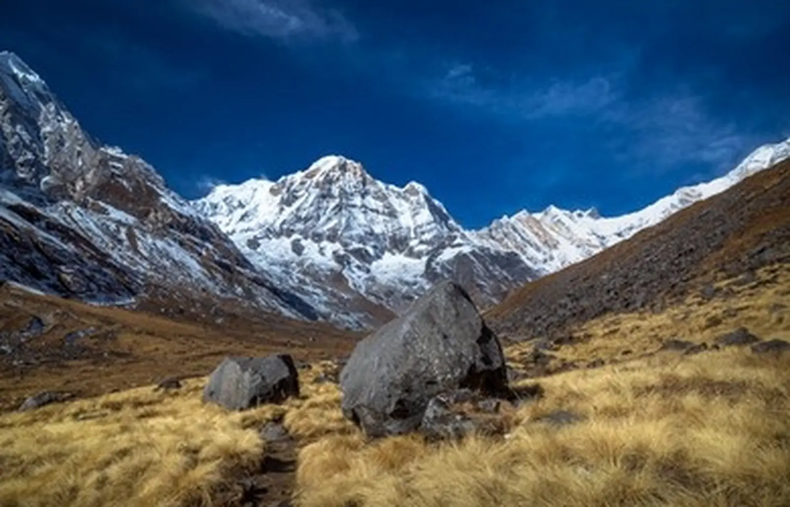 Annapurna Base Camp trail surrounded by towering Himalayan peaks in Nepal