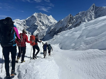 Climbers ascending Larke Peak North in the Manaslu region of Nepal during a high-altitude climb